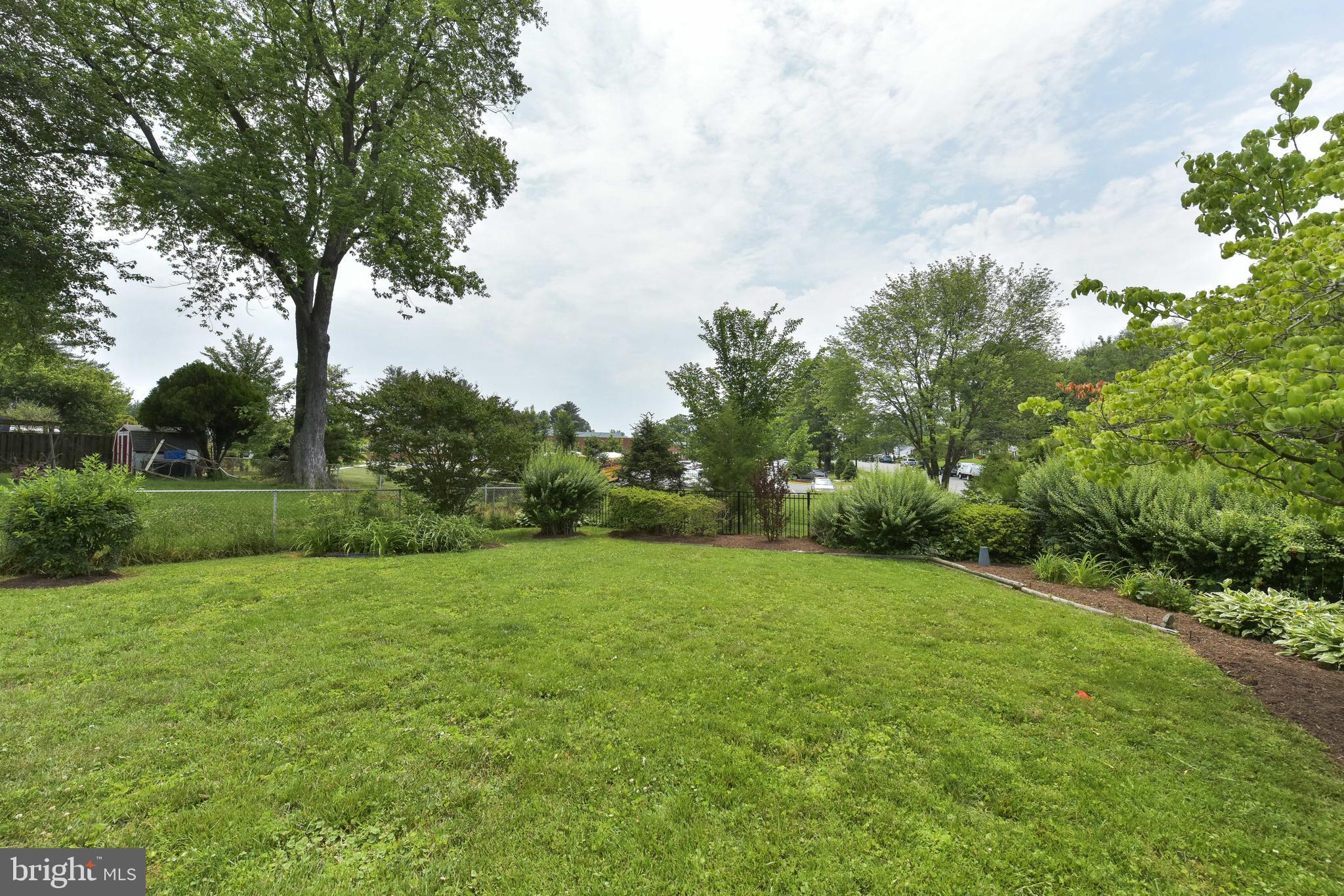 8021 Ellet Road Springfield, VA 22151 - Photo 52 of 53 a view of a grassy field with trees