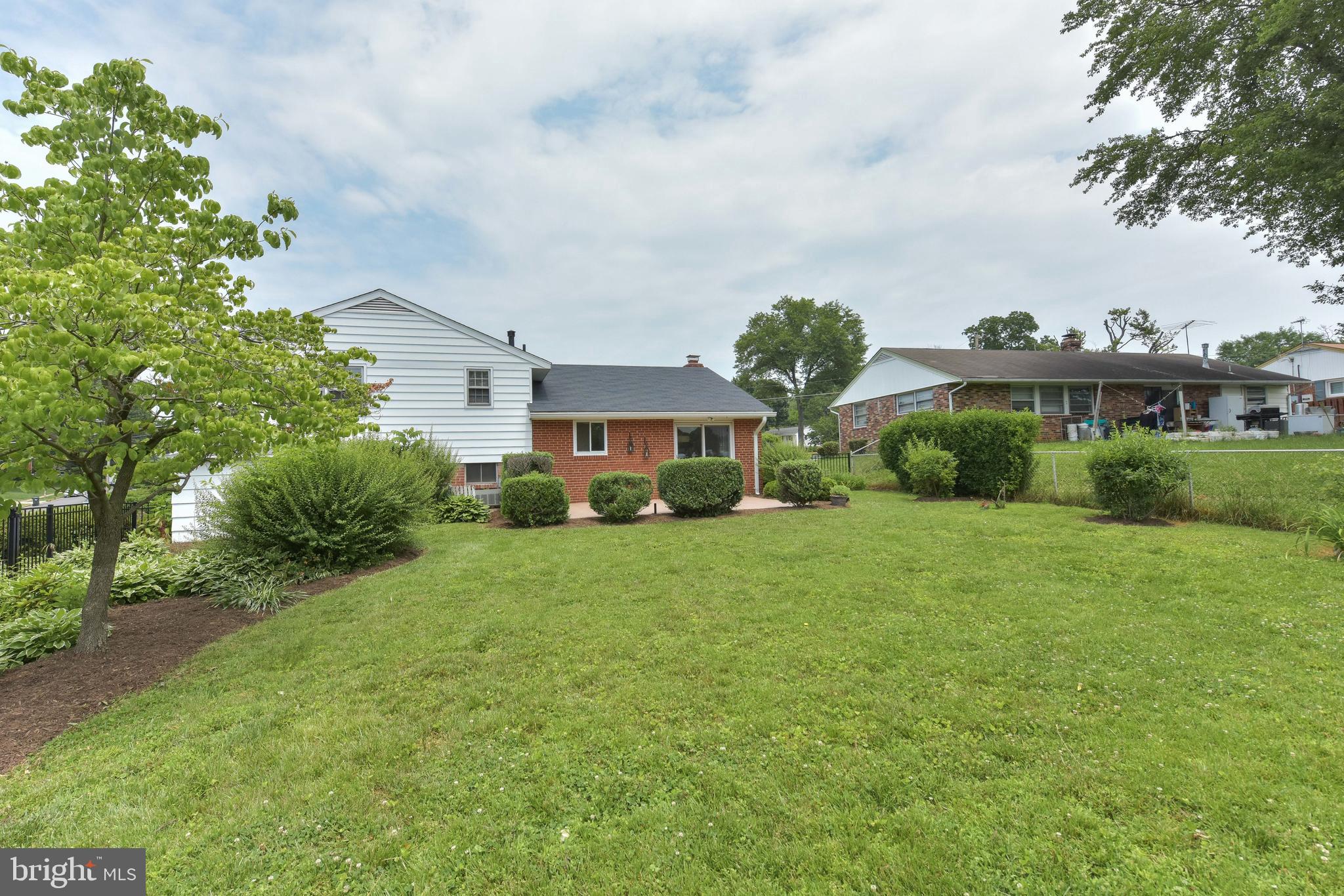8021 Ellet Road Springfield, VA 22151 - Photo 53 of 53 a front view of a house with a yard
