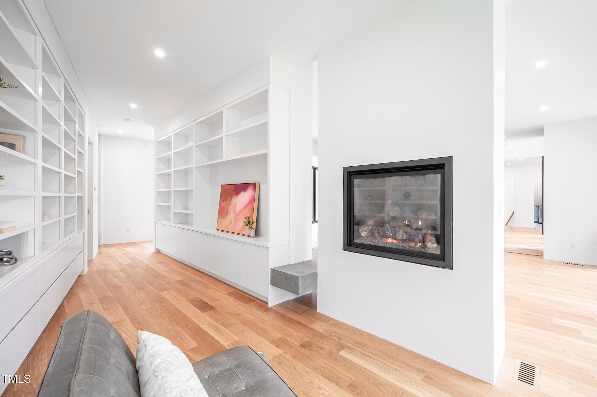 721 Jones Ferry Road Chapel Hill, NC 27516 - Photo 17 of 43 a view of a hallway with wooden floor and windows