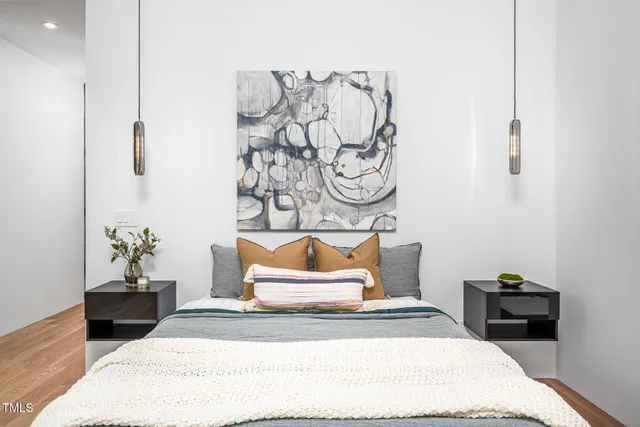 a bathroom with a double vanity sink and a large window