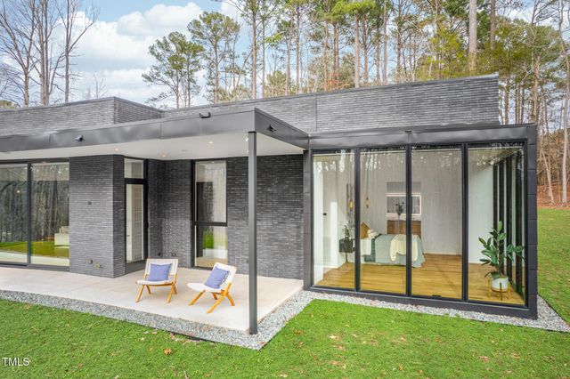 a garden view with a seating space