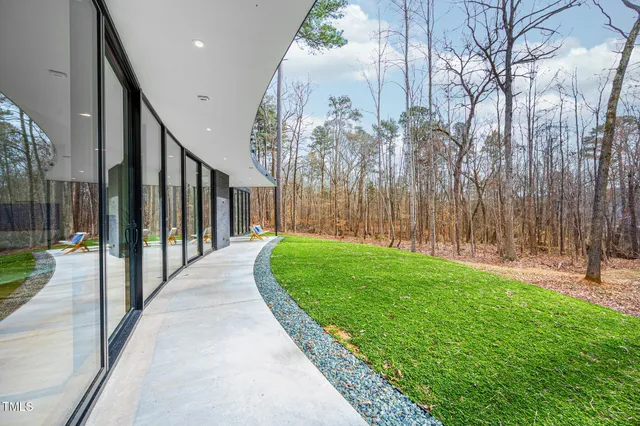 a view of a deck with a backyard