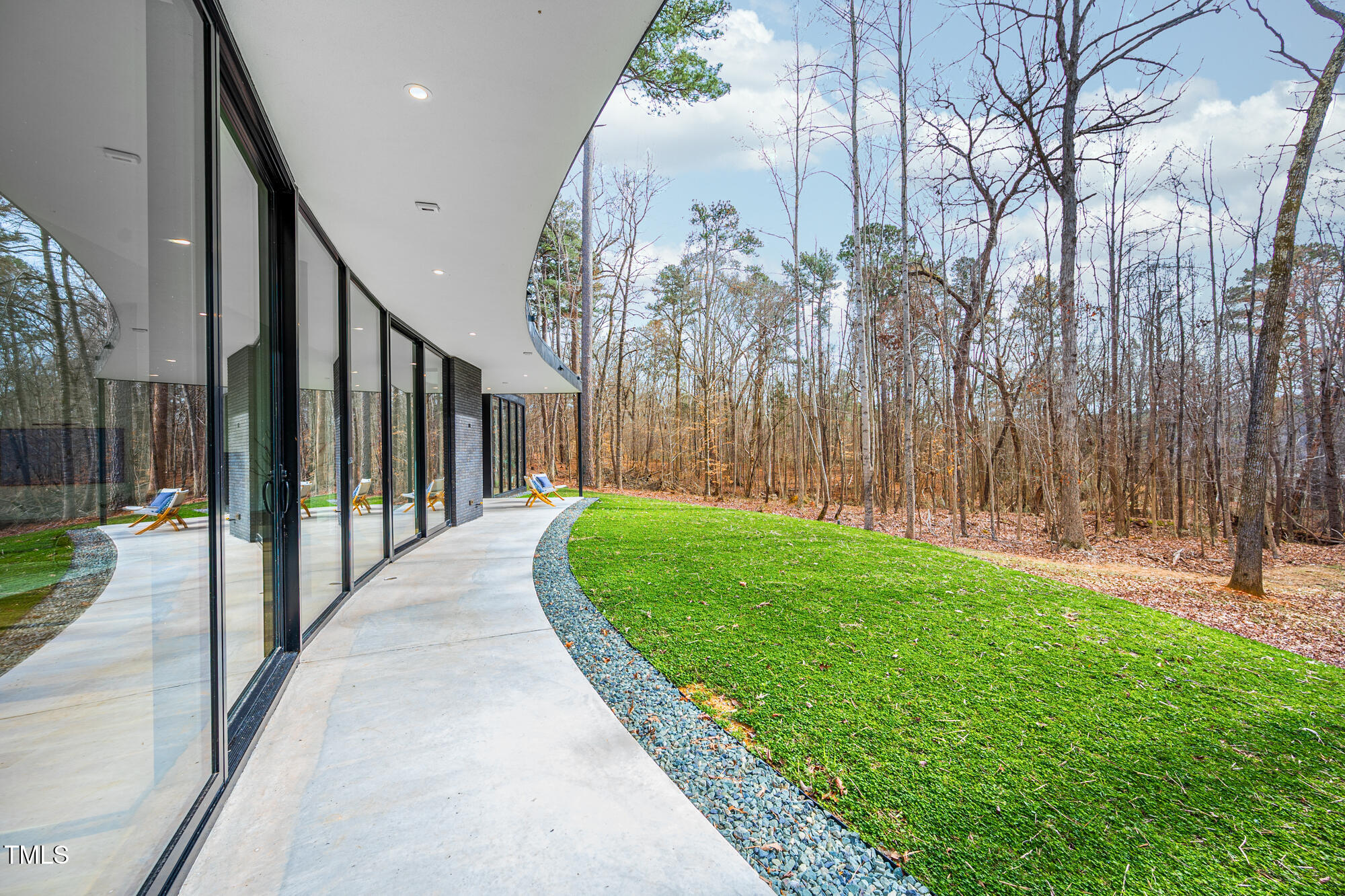 721 Jones Ferry Road Chapel Hill, NC 27516 - Photo 39 of 43 a view of a porch with a backyard