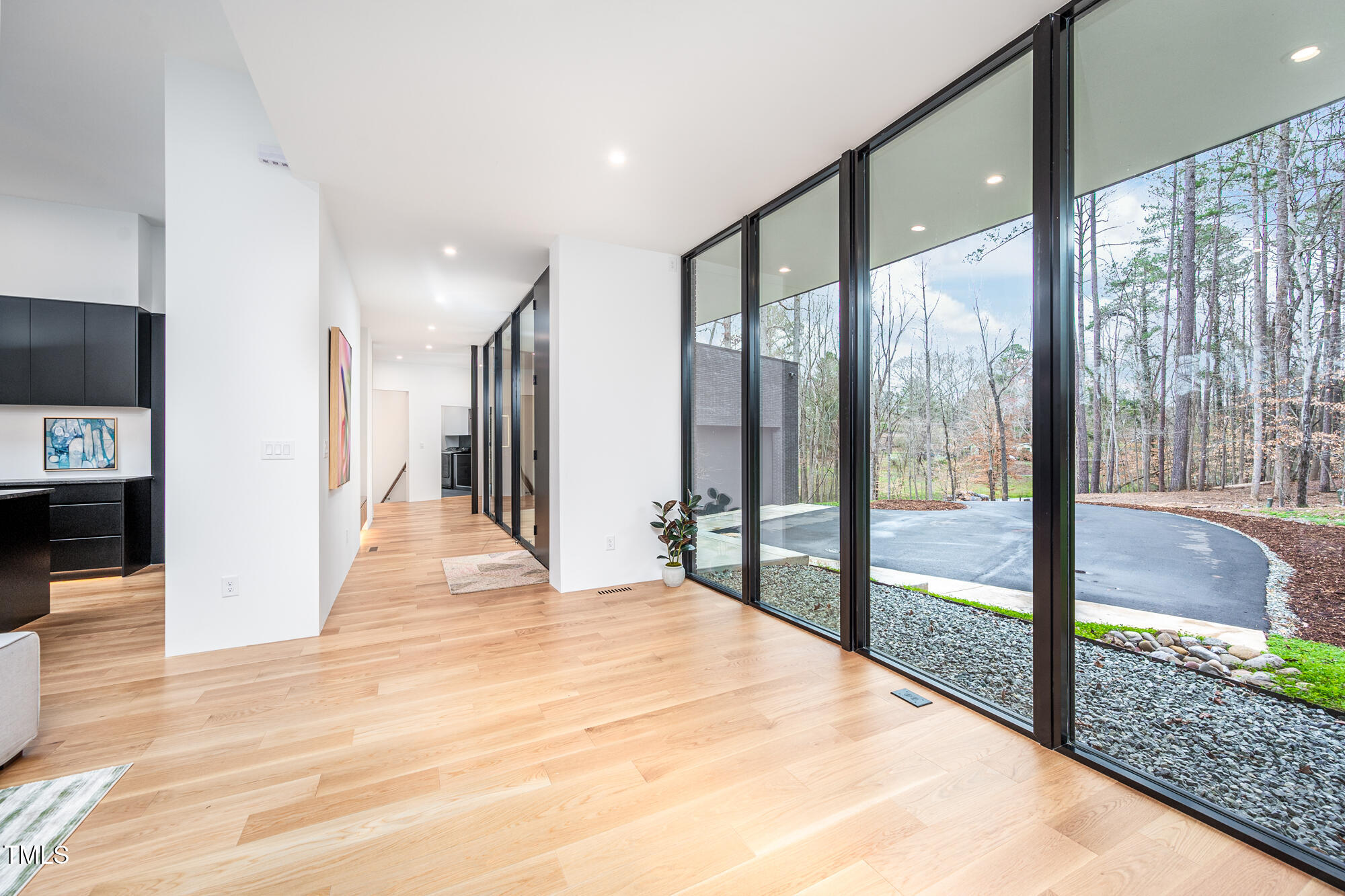 721 Jones Ferry Road Chapel Hill, NC 27516 - Photo 10 of 43 a large white room with a large window