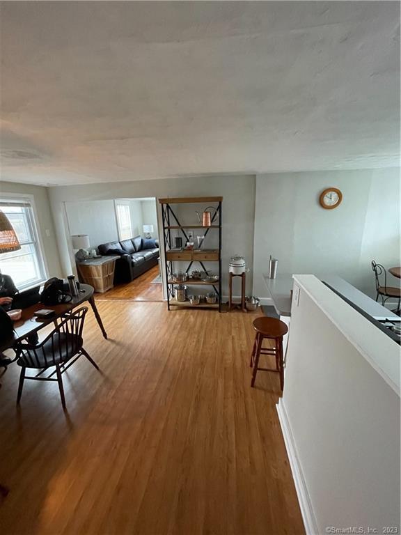 25 South End Road, Unit 2 East Haven, CT 06512 - Photo 12 of 18 a living room with furniture and a wooden floor