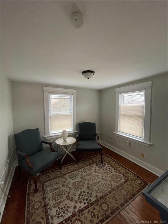 25 South End Road, Unit 2 East Haven, CT 06512 - Photo 10 of 18 a living room with furniture and a window