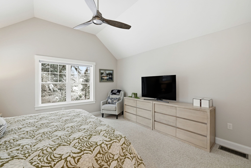 17 Inkberry Lane Plymouth, MA 02360 - Photo 11 of 30 a bedroom with a bed and a flat screen tv
