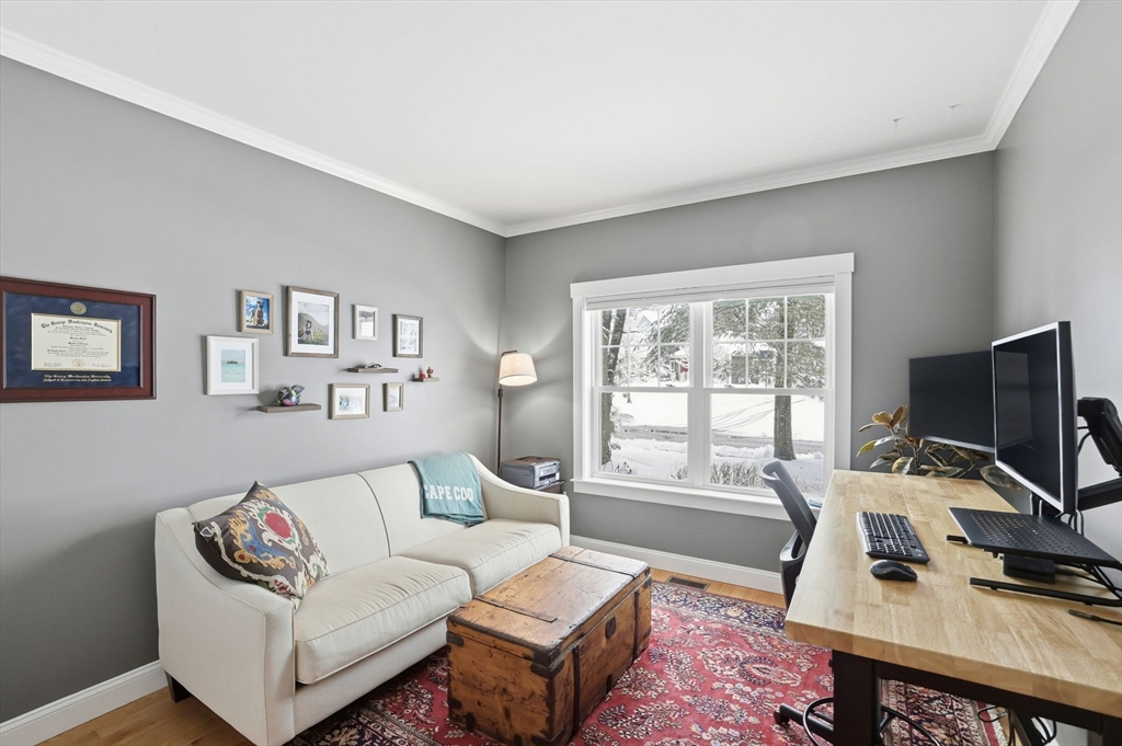 17 Inkberry Lane Plymouth, MA 02360 - Photo 15 of 30 a living room with furniture and a flat screen tv