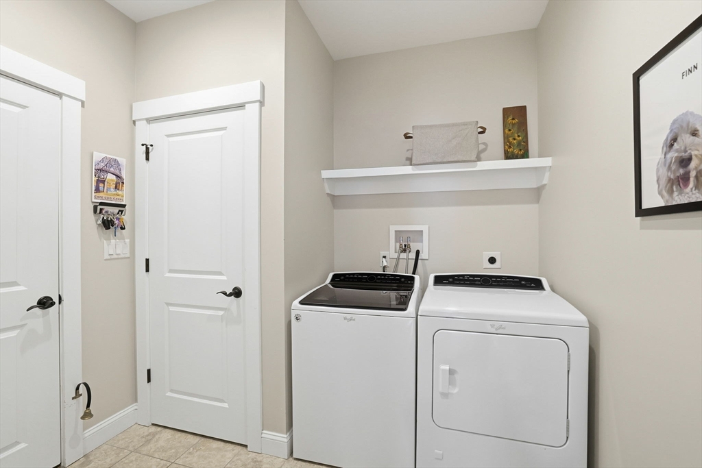 17 Inkberry Lane Plymouth, MA 02360 - Photo 18 of 30 a utility room with dryer and washer