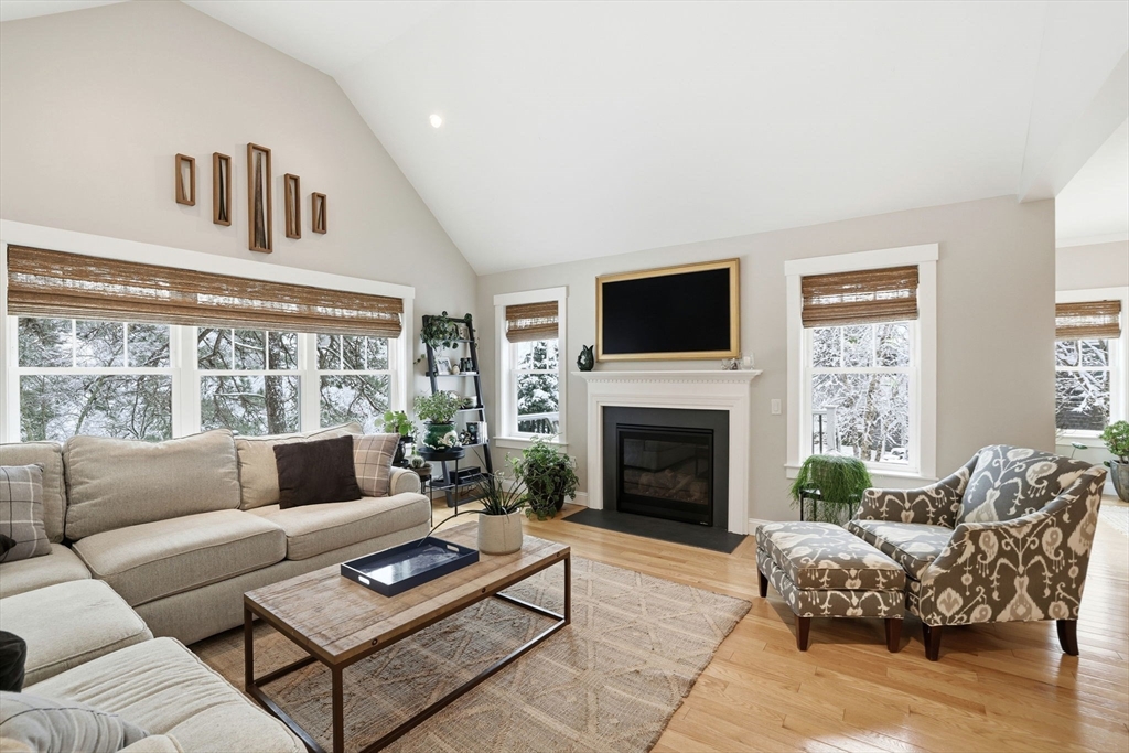 17 Inkberry Lane Plymouth, MA 02360 - Photo 5 of 30 a living room with furniture fireplace and a flat screen tv