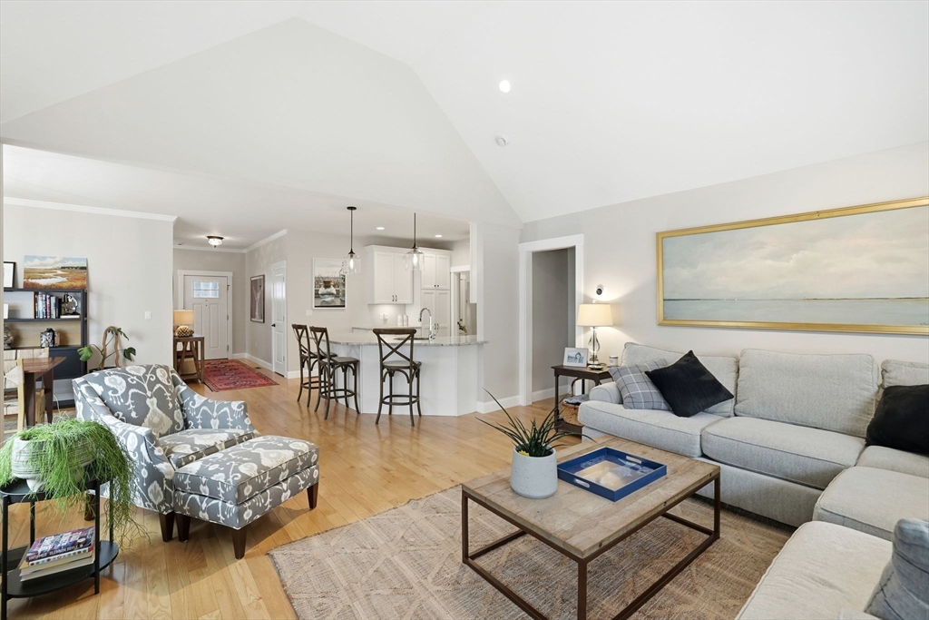 17 Inkberry Lane Plymouth, MA 02360 - Photo 7 of 30 a living room with furniture and a table