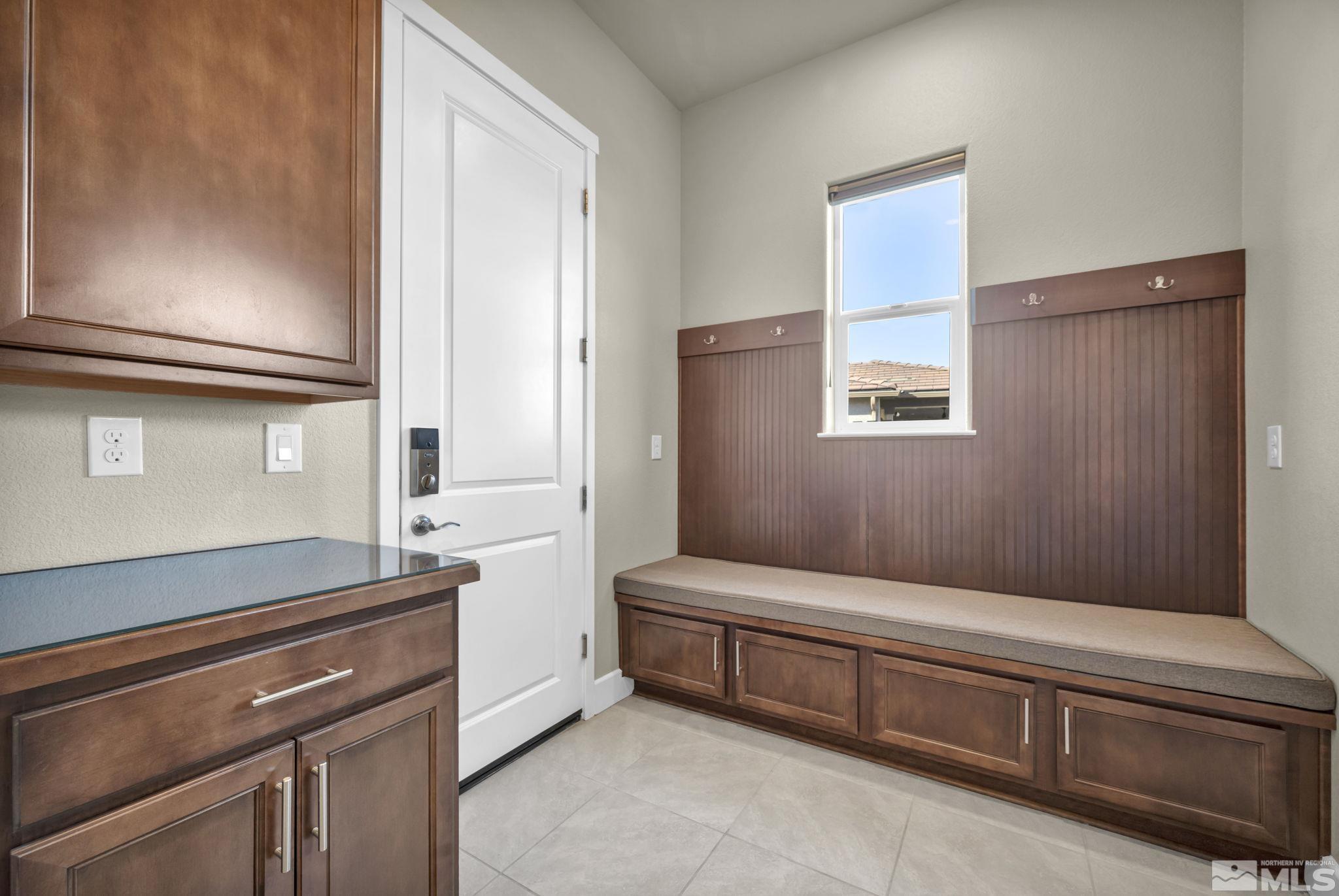 14264 Silver Moon Court Reno, NV 89521 - Photo 14 of 39 a bedroom with a bed and a dresser
