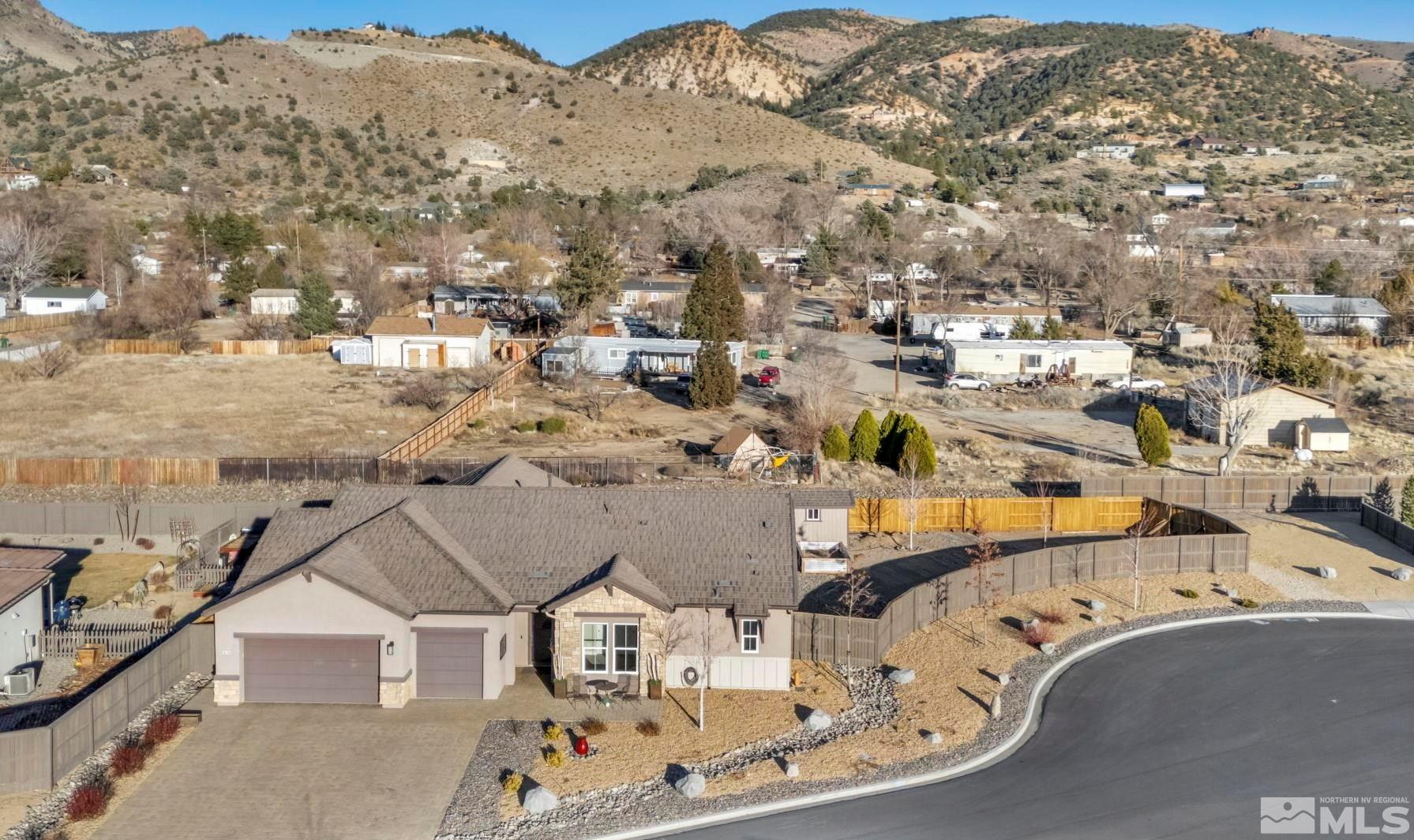 14264 Silver Moon Court Reno, NV 89521 - Photo 2 of 39 an aerial view of residential houses with outdoor space