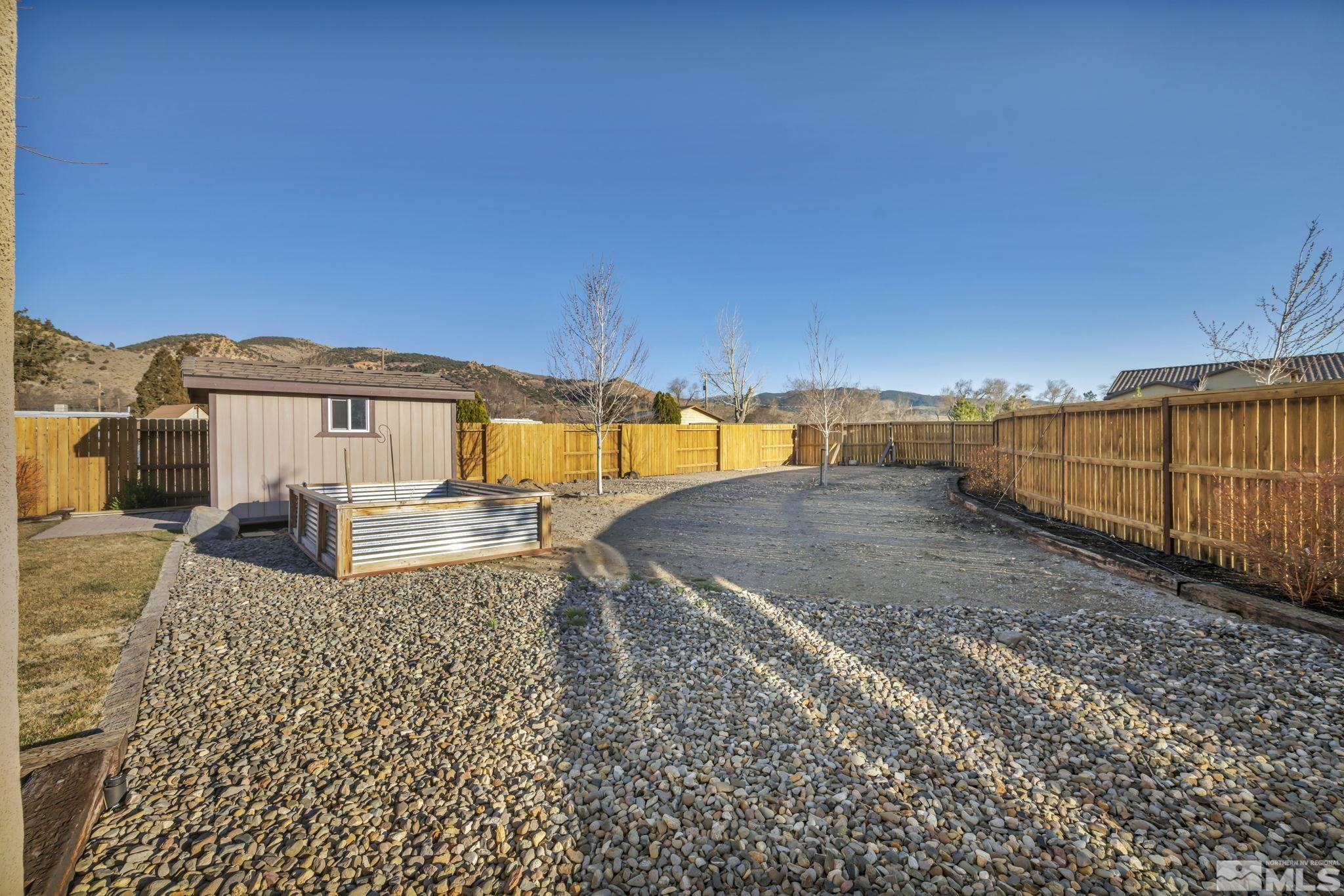 14264 Silver Moon Court Reno, NV 89521 - Photo 33 of 39 a view of a backyard