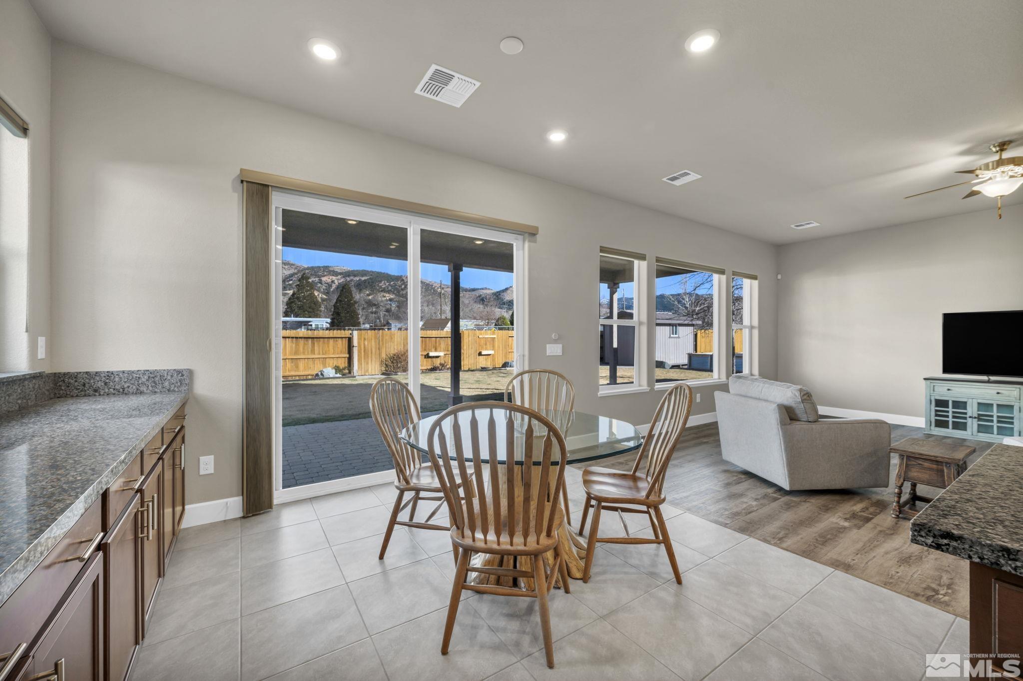 14264 Silver Moon Court Reno, NV 89521 - Photo 9 of 39 a view of a dining room with furniture