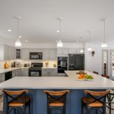 a front view of a house with a garage