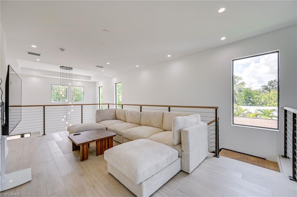 3400 Canal Street Naples, FL 34112 - Photo 20 of 28 2nd Living room with recessed lighting and light wood-type flooring