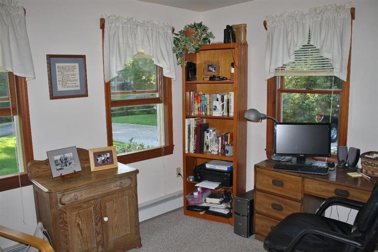 46 Deer Ridge Road Mashpee, MA 02649 - Photo 11 of 33 a room with furniture and a window