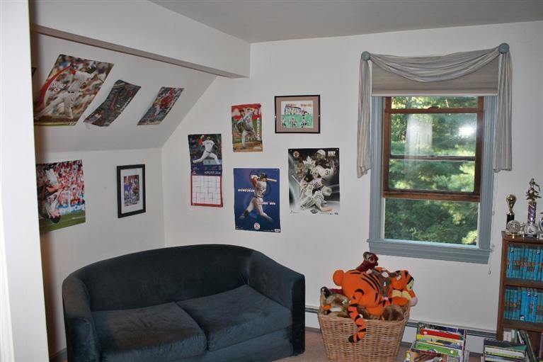 46 Deer Ridge Road Mashpee, MA 02649 - Photo 20 of 33 a living room with furniture and a window
