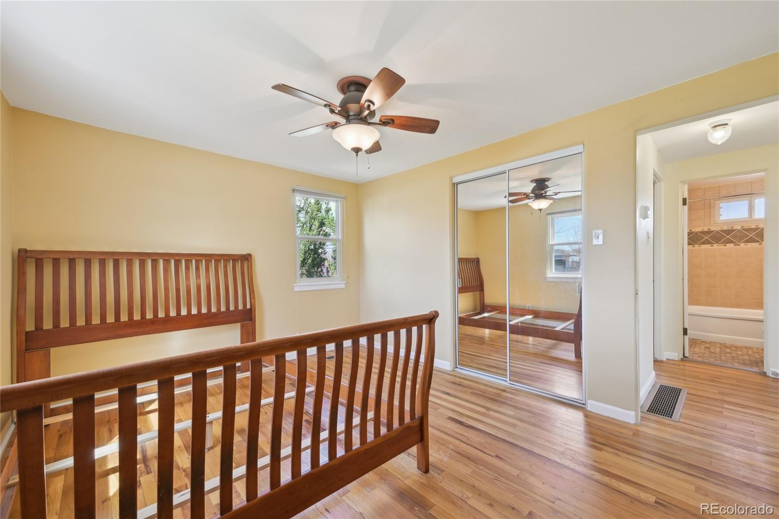 6819 Reno Drive Arvada, CO 80002 - Photo 18 of 32 a view of entryway with wooden floor