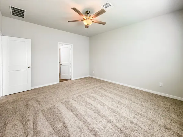 a view of a big room with carpet