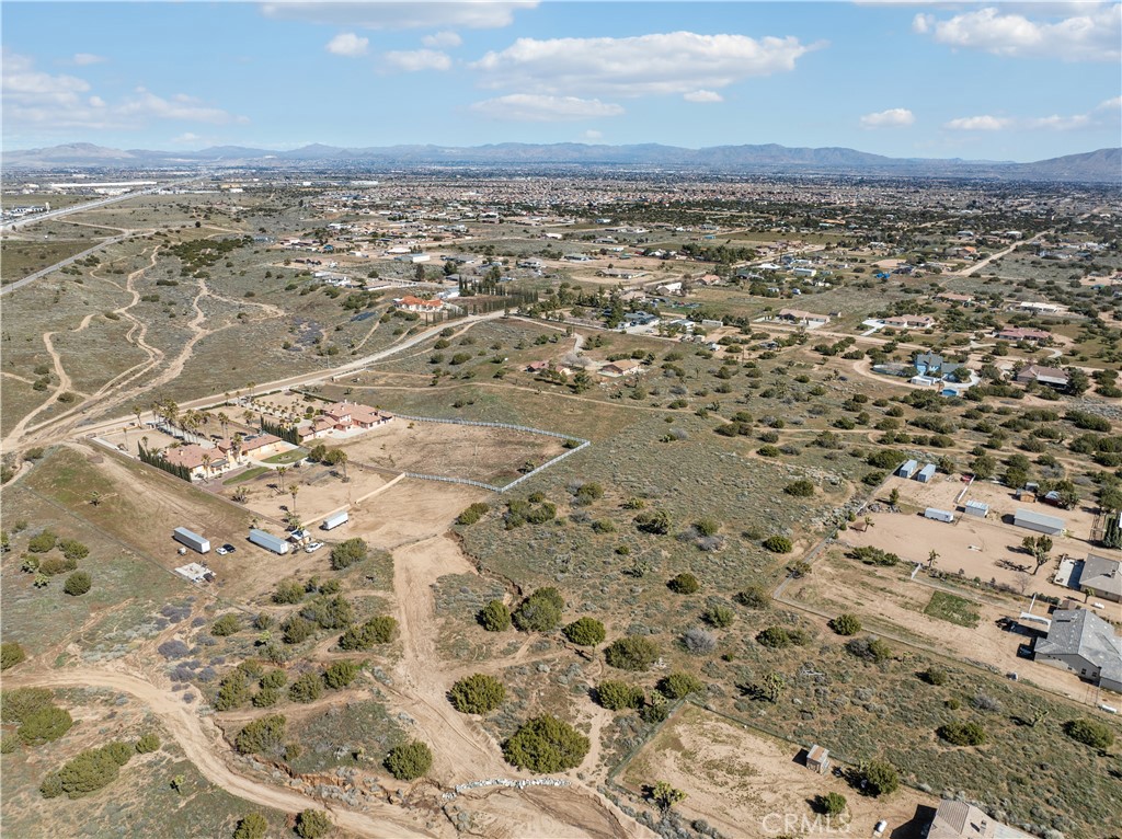 7971 Outpost Road Oak Hills, CA 92344 - Photo 3 of 10 an aerial view of residential houses with outdoor space