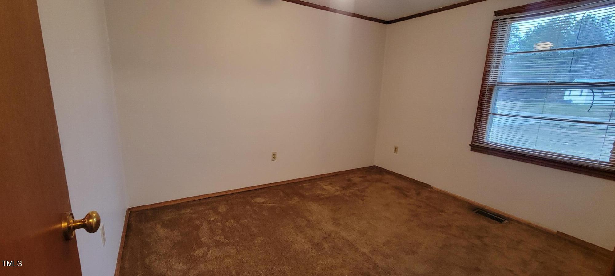 530 Broad Road Roxboro, NC 27573 - Photo 15 of 24 a view of a room with a gate