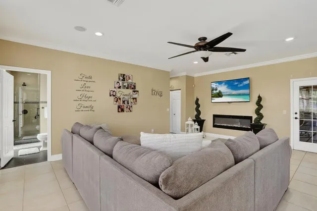 a view of a house with backyard sitting area and garden