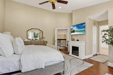 a outdoor space with patio the couches and a fireplace