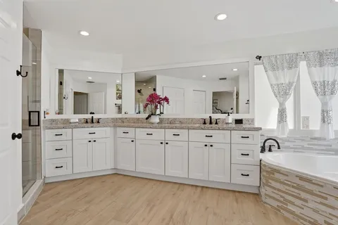 a outdoor space with patio the couches and a fireplace