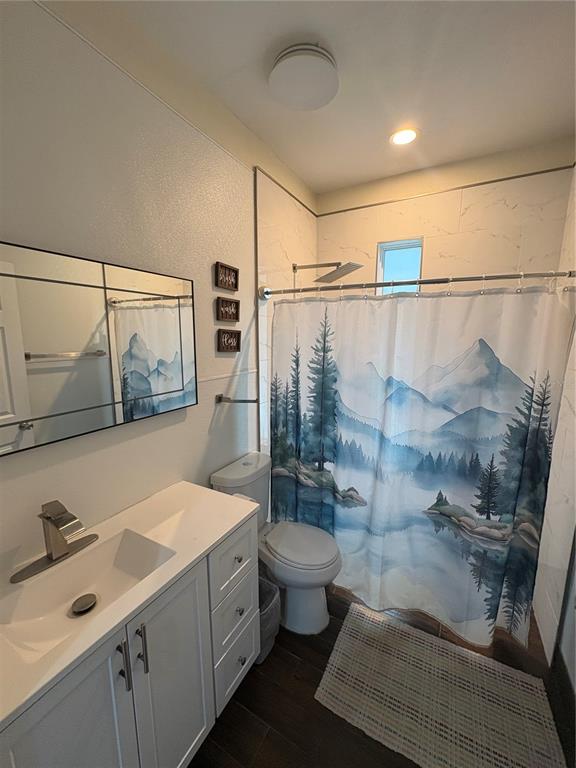 3715 Valley Tree Drive Tampa, FL 33610 - Photo 15 of 26 a bathroom with a double vanity sink toilet and shower