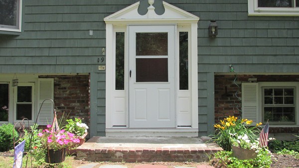 9 Highland Road Merrimac, MA 01860 - Photo 1 of 20 a front view of a house with a garden