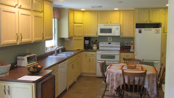 9 Highland Road Merrimac, MA 01860 - Photo 13 of 20 a kitchen with a sink appliances and cabinets
