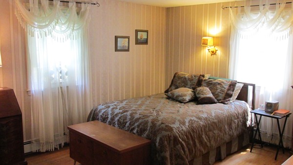 9 Highland Road Merrimac, MA 01860 - Photo 16 of 20 a bedroom with a bed and a window
