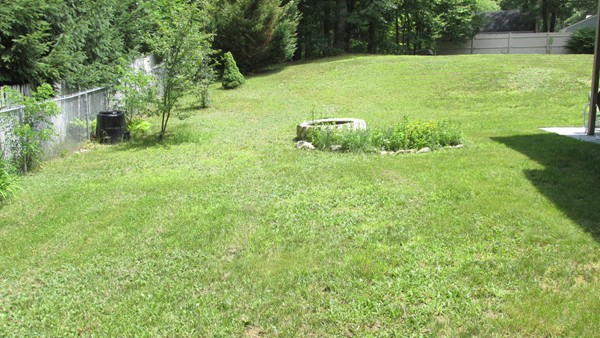 9 Highland Road Merrimac, MA 01860 - Photo 4 of 20 a view of a golf course with a yard