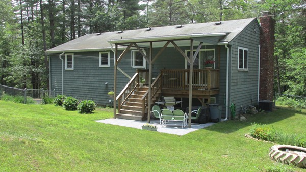 9 Highland Road Merrimac, MA 01860 - Photo 6 of 20 a view of a house with backyard