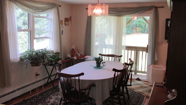 9 Highland Road Merrimac, MA 01860 - Photo 9 of 20 a view of a dining room with furniture window and wooden floor
