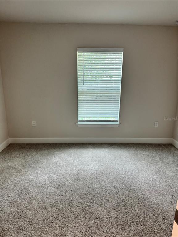 1157 Duquesne Road Venice, FL 34293 - Photo 5 of 15 an empty room with a window
