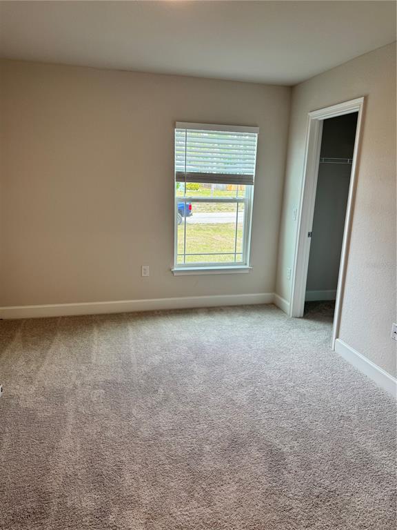 1157 Duquesne Road Venice, FL 34293 - Photo 7 of 15 an empty room with a window