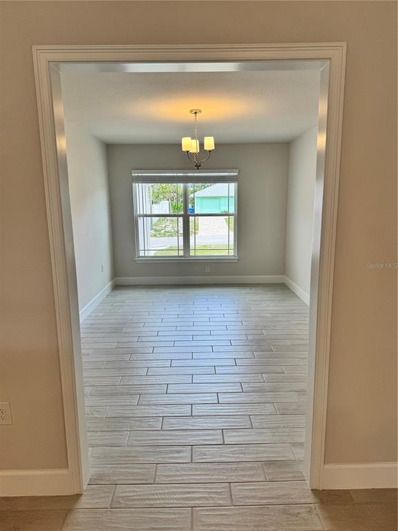 1157 Duquesne Road Venice, FL 34293 - Photo 9 of 15 a view of empty room with windows