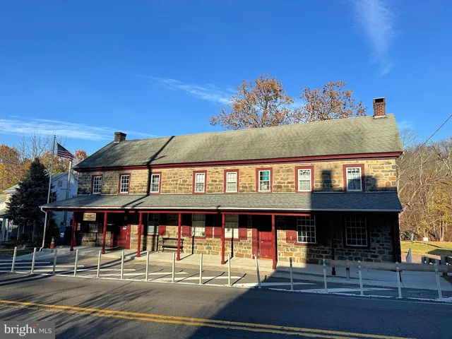 a front view of a house with a outdoor space