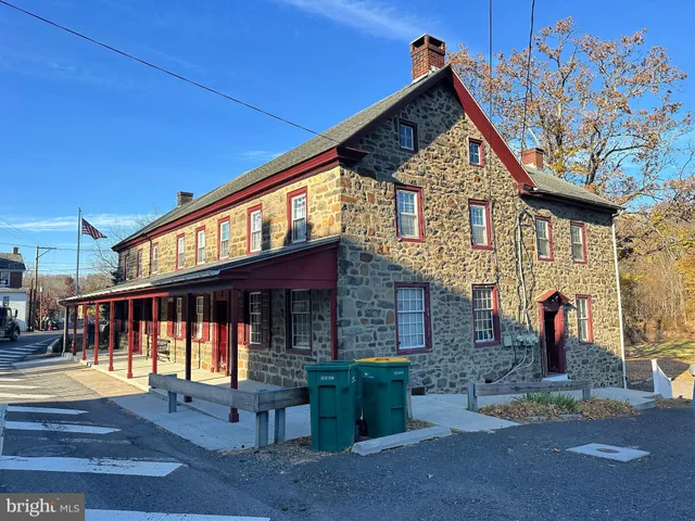 a view of a house with large windows