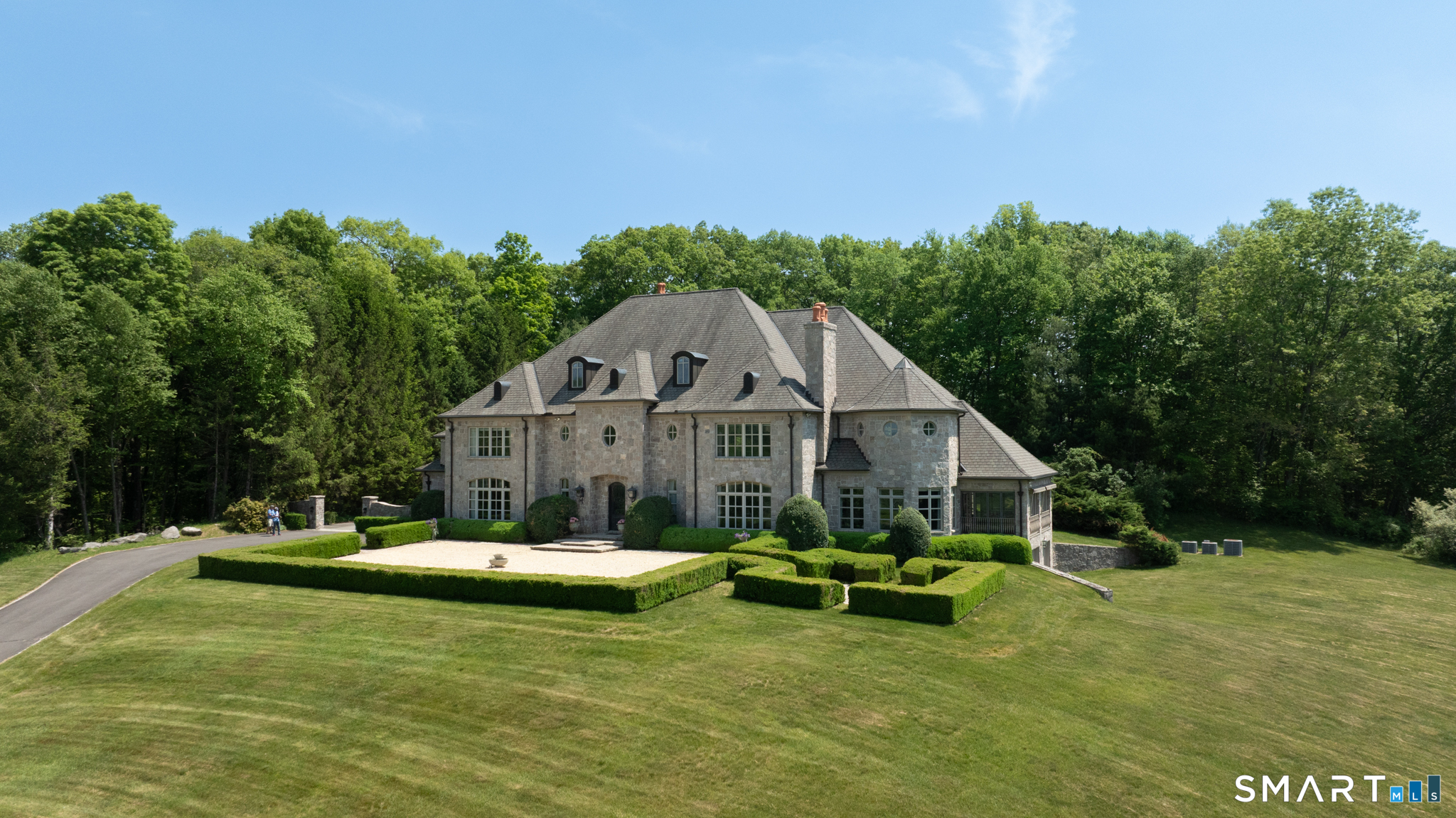 7 Equestrian Ridge Newtown, CT 06470 - Photo 2 of 40 a view of a house with a yard patio and sitting area