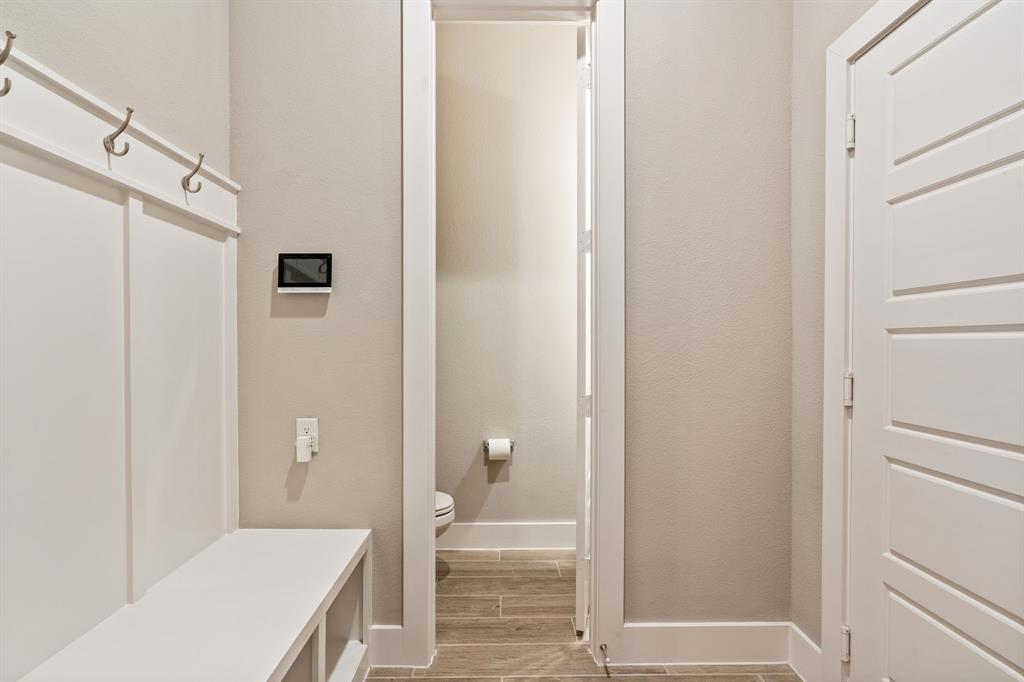 1314 Buttermere Street Forney, TX 75126 - Photo 21 of 32 a bathroom with a shower and toilet