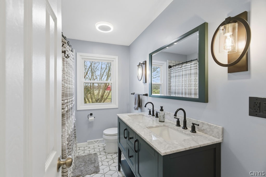 7017 Bolivar Road Sullivan, NY 13037 - Photo 17 of 40 In 2024 this main bathroom was updated with new fl