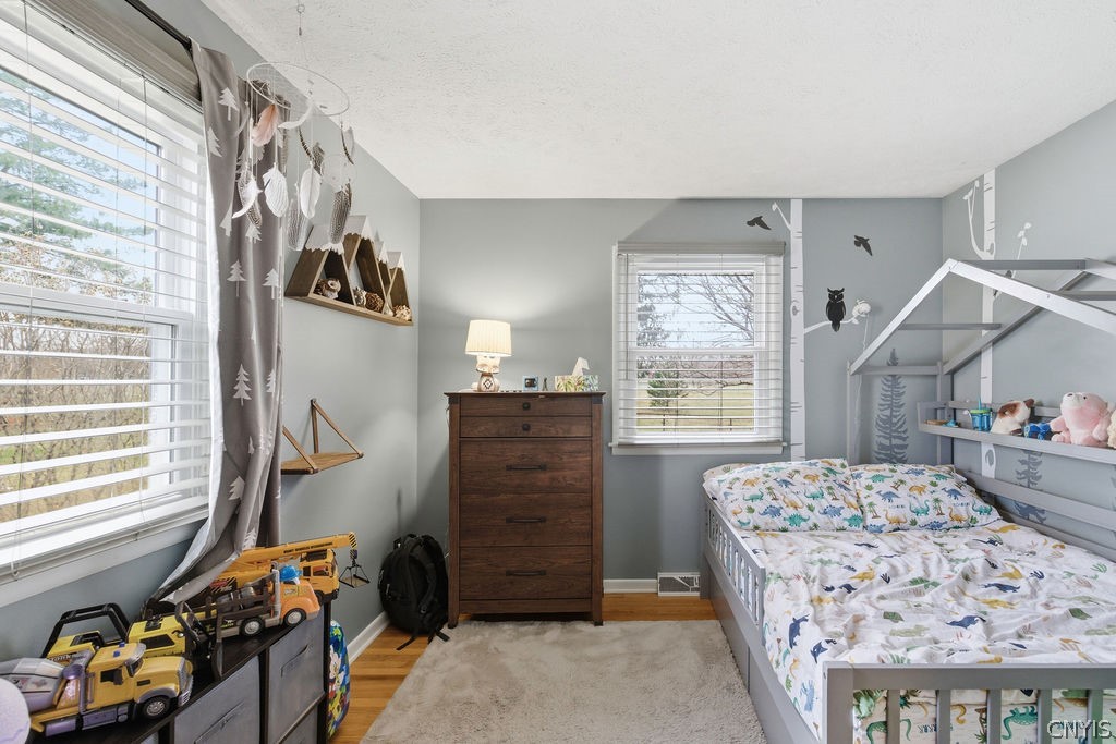 7017 Bolivar Road Sullivan, NY 13037 - Photo 19 of 40 The second bedroom in the home has beautiful hardw