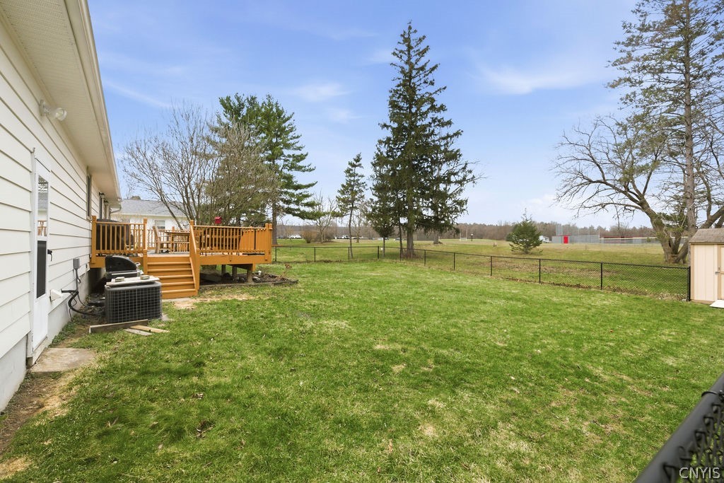 7017 Bolivar Road Sullivan, NY 13037 - Photo 30 of 40 This view of the fenced in backyard faces the base
