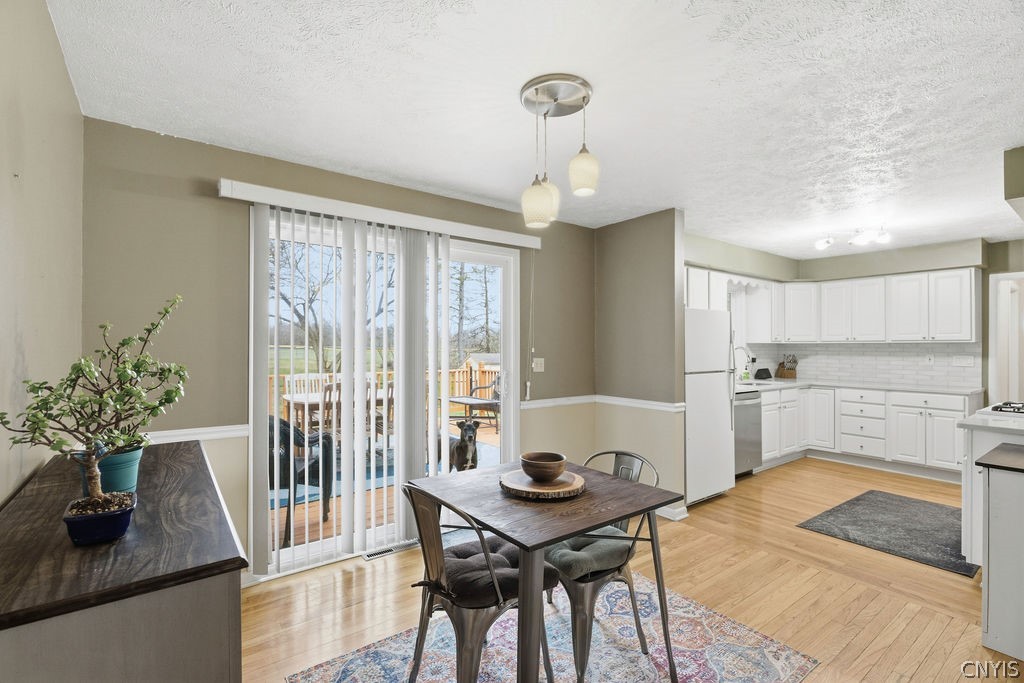 7017 Bolivar Road Sullivan, NY 13037 - Photo 6 of 40 The eating space adjacent to the kitchen can accom
