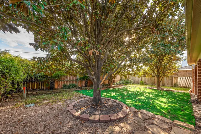 a view of a balcony with dining table