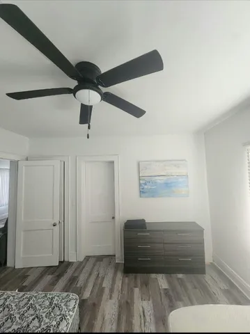 a view of entryway with wooden floor